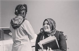 Help Amna ontsnappen uit Libië en haar droom te verwezenlijken